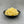 Load image into Gallery viewer, Cooked, yellow Pineapple tapioca fruit pearls in a small black ceramic dish
