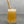 Load image into Gallery viewer, A glass of Lychee Bubble Tea with Pineapple tapioca fruit pearls, ice and a reusable bamboo bubble tea straw
