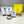Load image into Gallery viewer, Contents of a 12 pack Matcha Latte Bubble Tea Kit. Matcha powder and Yuzu pearls in pouches, uncooked Yuzu pearls in a ceramic dish, scoop, cardboard gift box