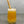 Load image into Gallery viewer, A glass of Passionfruit Bubble Tea with Pineapple tapioca fruit pearls, ice and a reusable bamboo bubble tea straw
