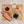 Load image into Gallery viewer, Rose gold shaker displayed with cooked Blueberry pearls, a bamboo straw, Lychee and Passionfruit fruit mix, a glass with ice and brewed tea in a cup