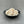 Load image into Gallery viewer, Uncooked Yuzu tapioca fruit pearls in a small black ceramic dish