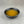 Load image into Gallery viewer, Small black ceramic dish filled with yellow Yuzu fruit mix