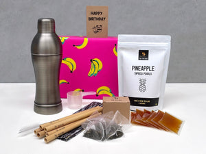 6 pack Passionfruit Bubble Tea gift pack contents. Including dark grey cocktail shaker, bamboo straws and greeting card