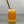 Load image into Gallery viewer, A glass of Peach Bubble Tea with Lychee pearls, ice and a gold stainless steel straw
