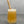 Load image into Gallery viewer, A glass of Lychee Bubble Tea with Pineapple tapioca fruit pearls, ice and a reusable bamboo bubble tea straw
