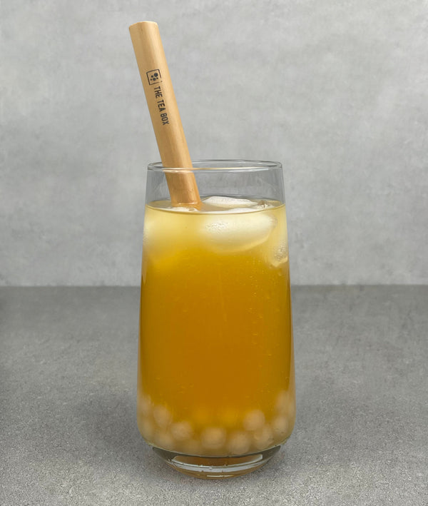 Completed Mango Bubble Tea with Pineapple tapioca pearls and Bamboo Bubble Tea Straw