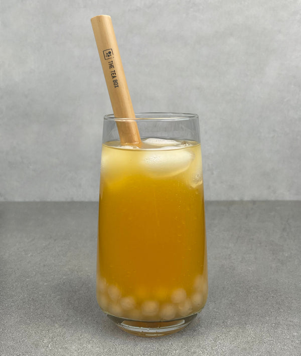 Completed Passionfruit Bubble Tea with Pineapple tapioca pearls and Bamboo Bubble Tea Straw