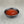 Load image into Gallery viewer, Small black ceramic dish filled with bright red, Red Grapefruit fruit mix
