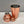 Load image into Gallery viewer, Unassembled rose gold 3-piece shaker with a shiny brushed finish in traditional cobbler style. Showing the cup, strainer and cap
