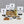 Load image into Gallery viewer, Contents of 9 pack Starter Kit with Cocktail Shaker. Pouch of 3 serve Taro Powder, 3 serves Pineapple Tapioca Pearls, 3 serves Milk Tea Powder, 6 serves Brown Tapioca Pearls, 3 sachets Passionfruit fruit mix, 3 wide Bamboo Bubble Tea Straws, 6 English Breakfast Tea Bags, stainless steel Cocktail Shaker in brushed gold
