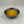 Load image into Gallery viewer, Small black ceramic dish filled with yellow Yuzu fruit mix
